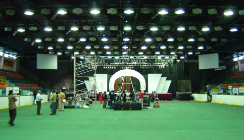 Officials Preparing the Ice Rink for an Evening Event